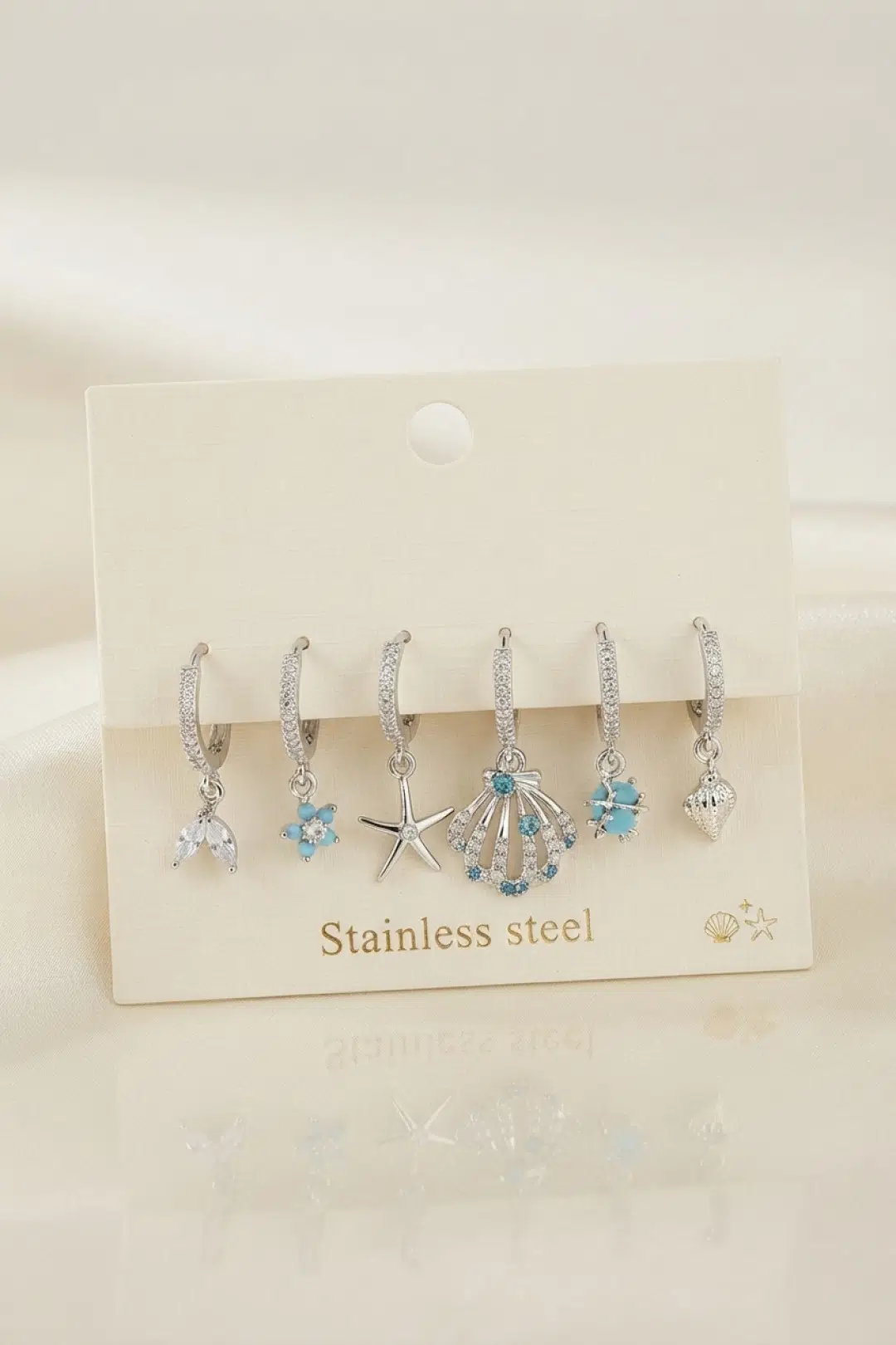 Gümüş Renk Deniz Kabuğu Konsept Kadın Küpe Seti - EBJ260822W46352