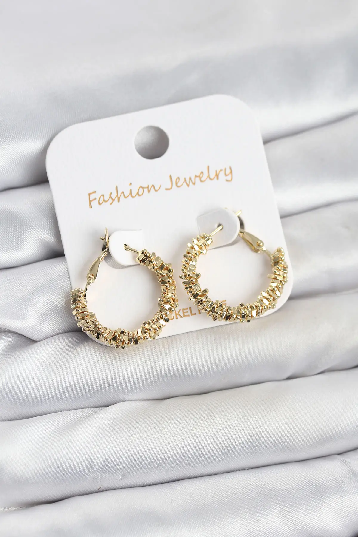 Pirinç Gold Renk Küçük Tırtıklı Halka Model Kadın Küpe - EBJ261010W47176